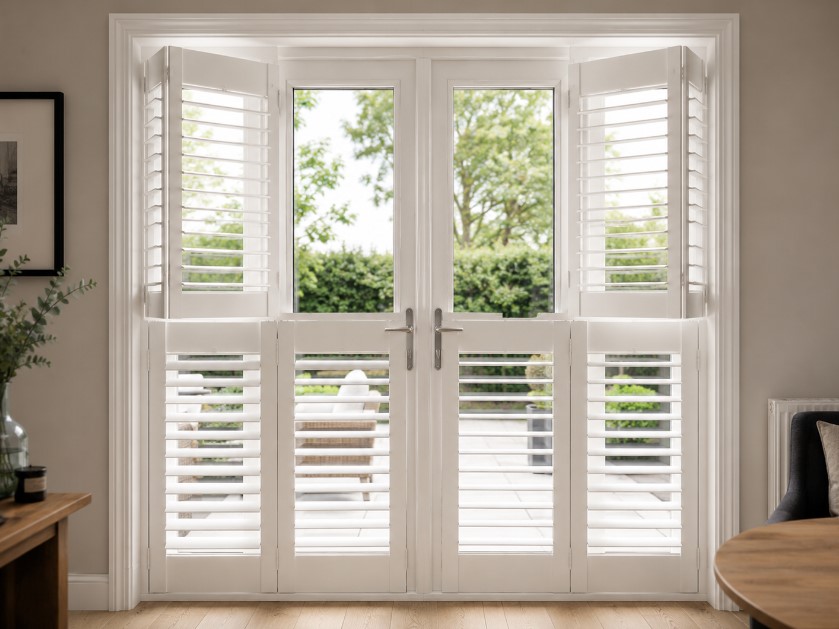 Tier-on-tier shutters for patio doors
